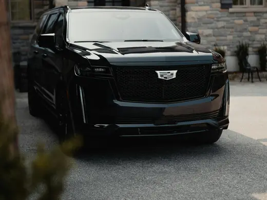 Black Cadillac Escalade luxury SUV